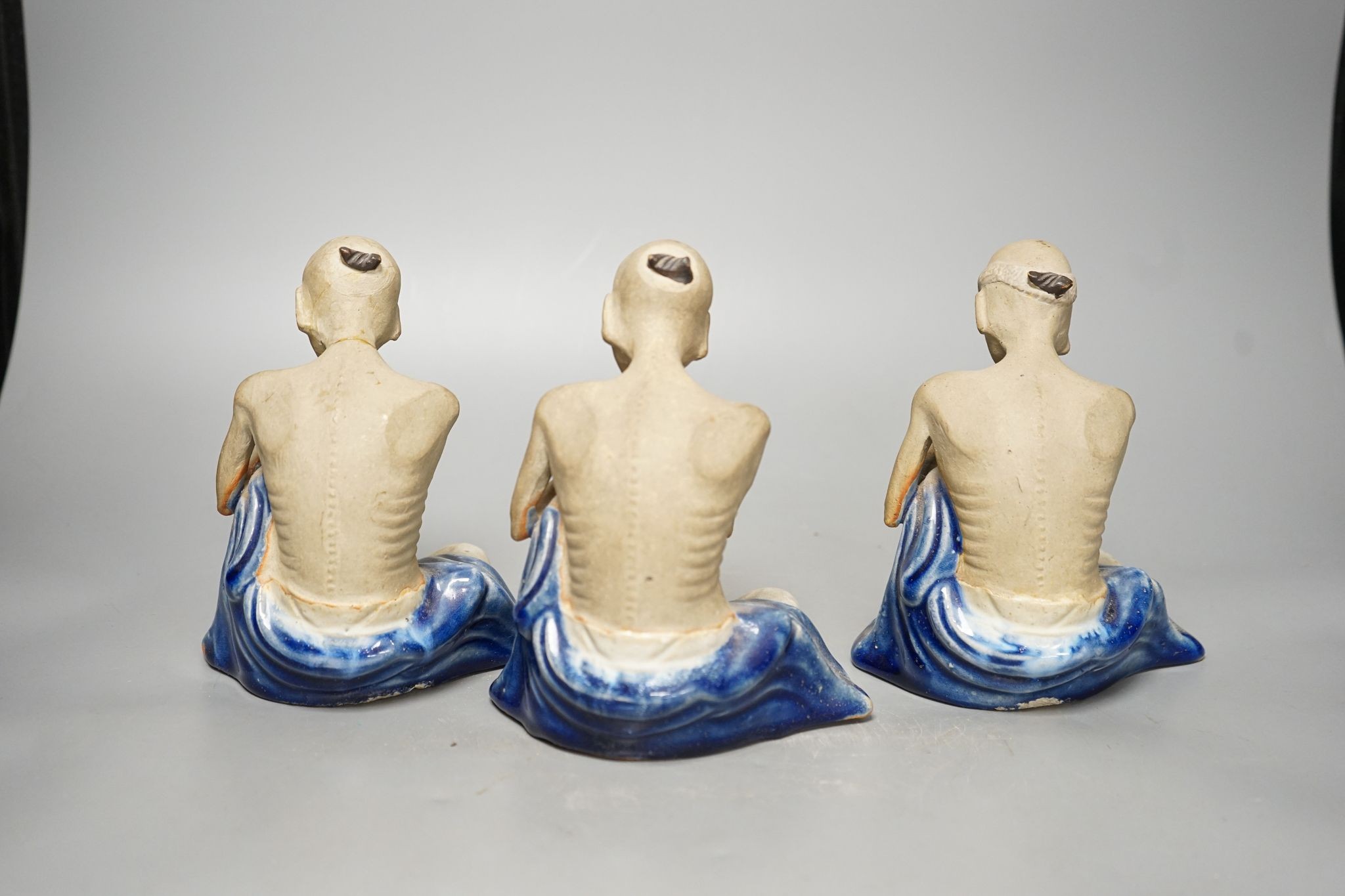 A set of three Shiwan pottery figures of Inohan, 17cm